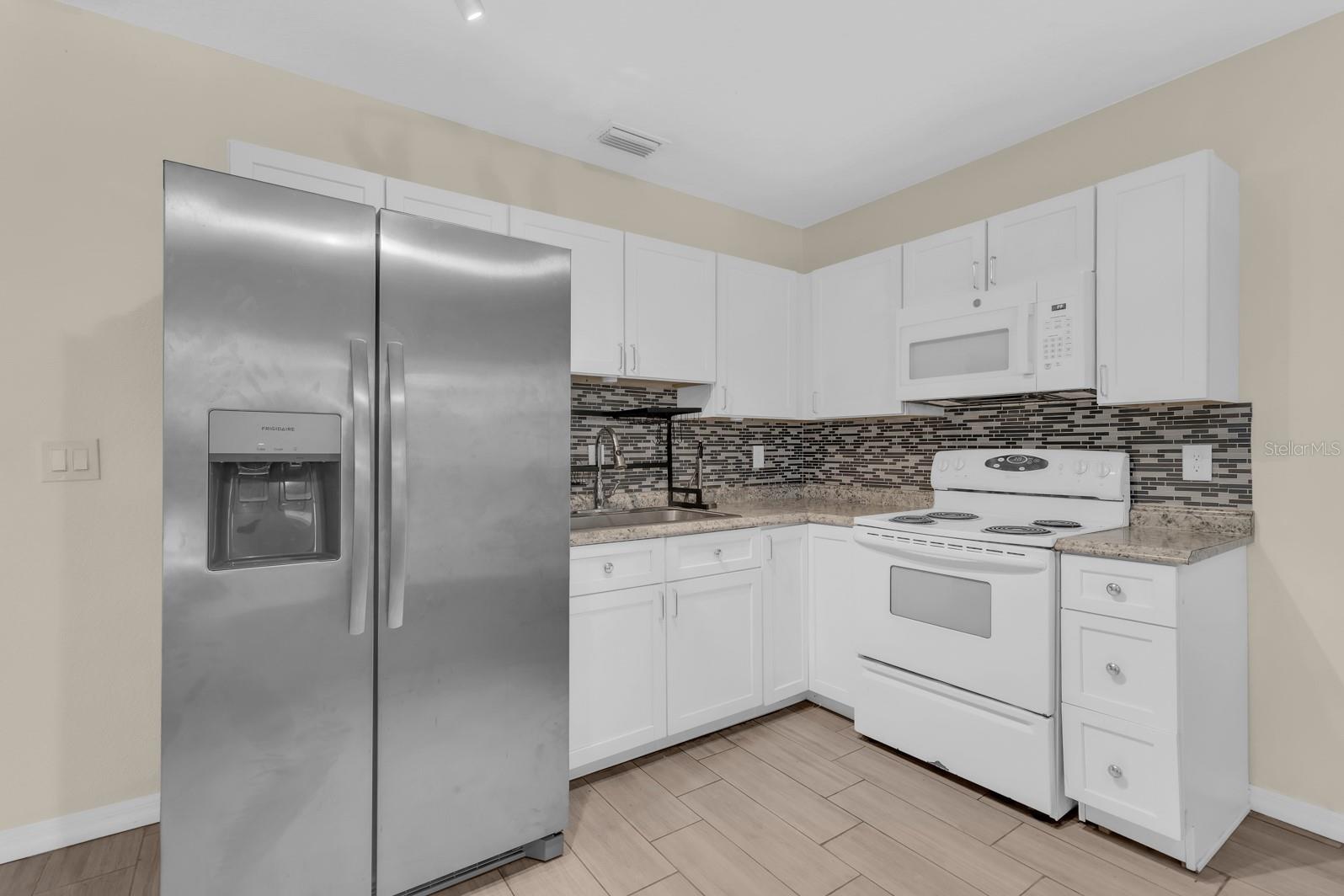 613 E 2ND ST #203 — photo 5