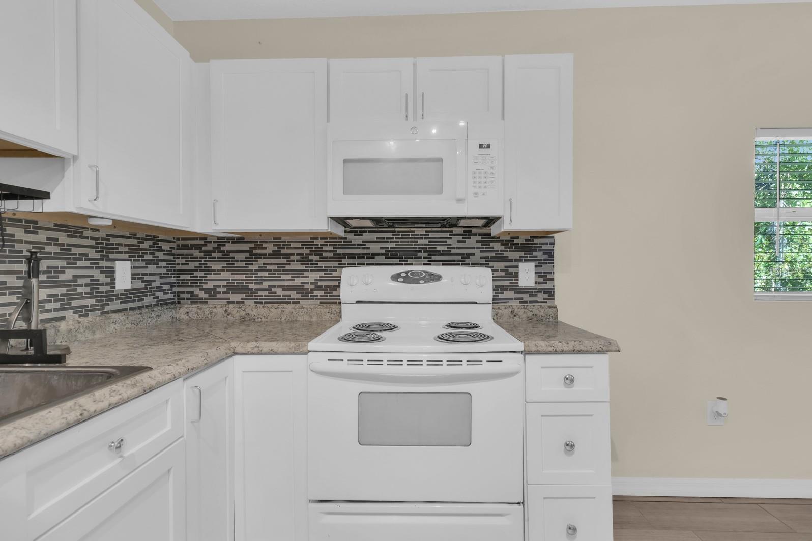 613 E 2ND ST #203 — photo 6