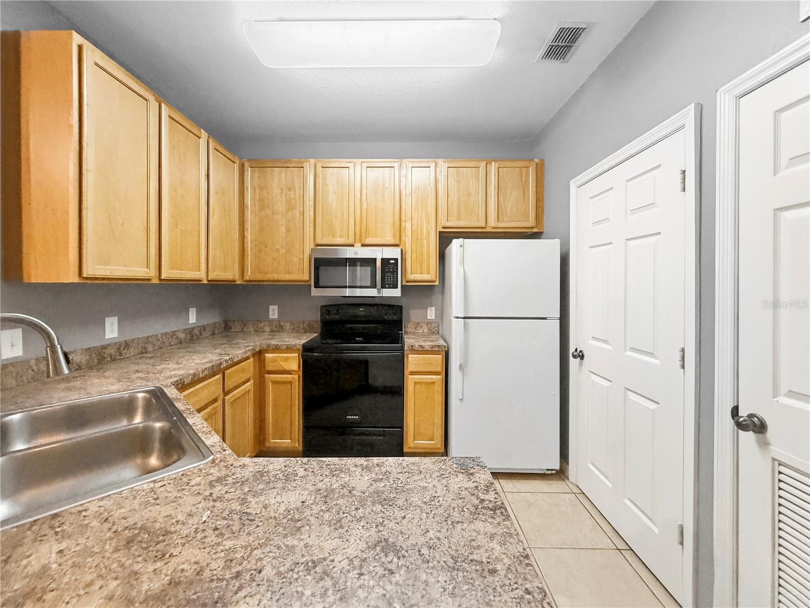 10209 COURTNEY PALMS BLVD #203 — photo 4