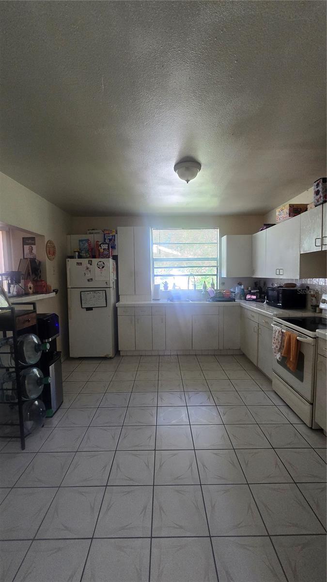 1208 E 26TH AVE — photo 3