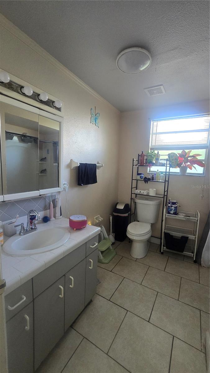 1208 E 26TH AVE — photo 7